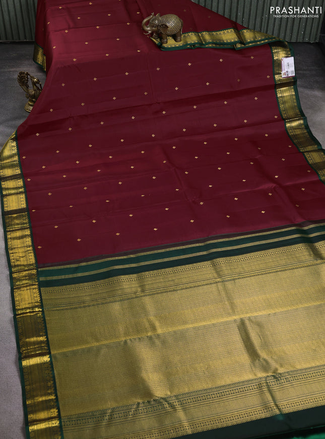 Pure kanchipuram silk saree deep maroon and bottle green with zari woven buttas and zari woven korvai border