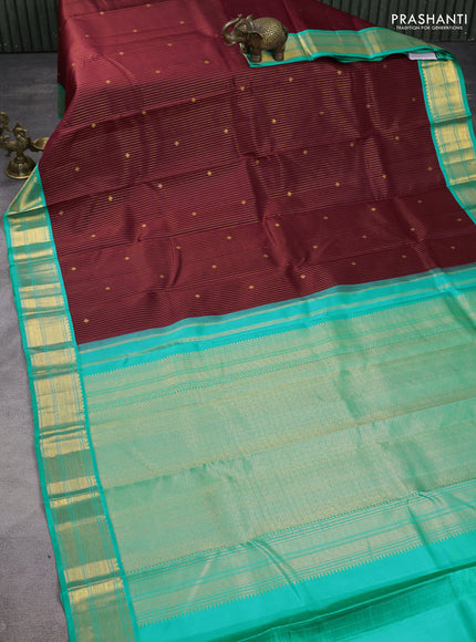 Pure kanchipuram silk saree deep maroon and teal blue with allover zari weaves & buttas and zari woven korvai border