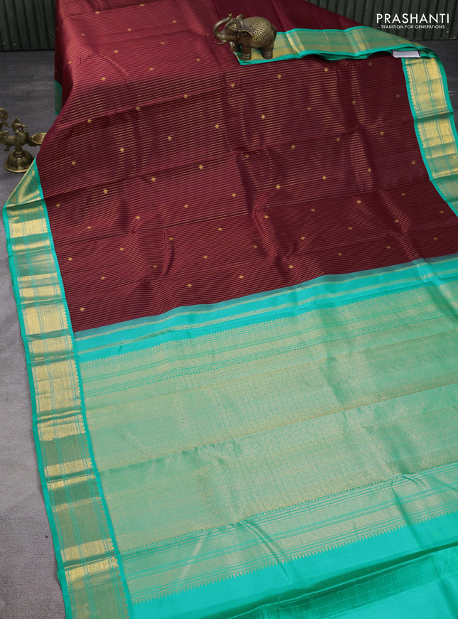 Pure kanchipuram silk saree deep maroon and teal blue with allover zari weaves & buttas and zari woven korvai border