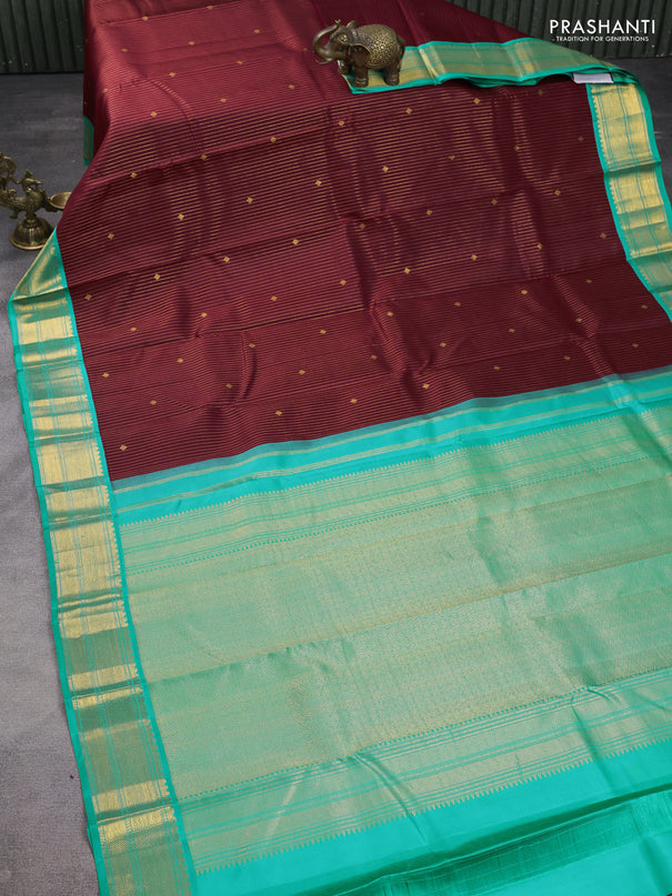 Pure kanchipuram silk saree deep maroon and teal blue with allover zari weaves & buttas and zari woven korvai border
