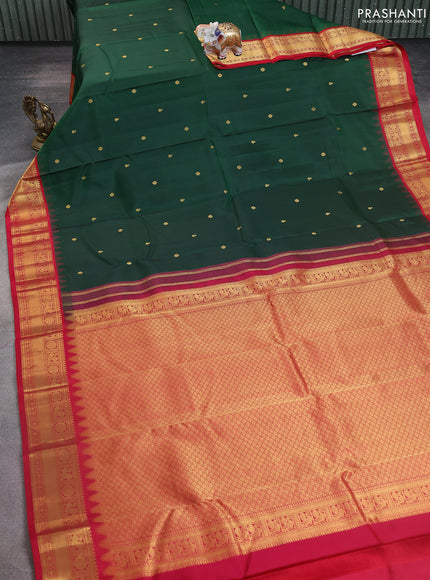 Pure kanchipuram silk saree bottle green and red with zari woven buttas and temple design zari woven border