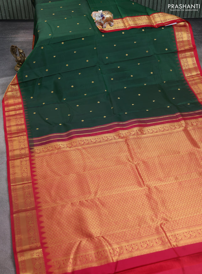 Pure kanchipuram silk saree bottle green and red with zari woven buttas and temple design zari woven border