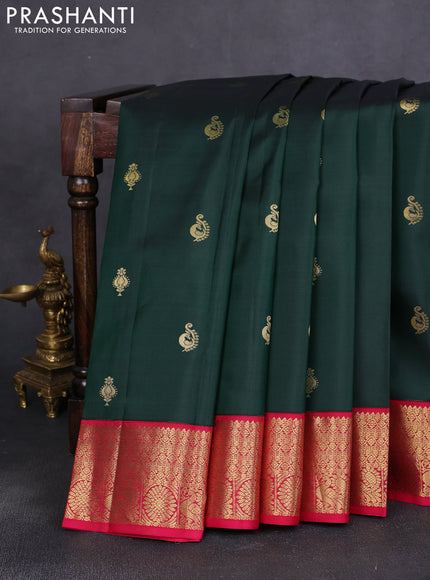 Pure kanchipuram silk saree bottle green and pink with allover zari woven buttas and zari woven korvai border