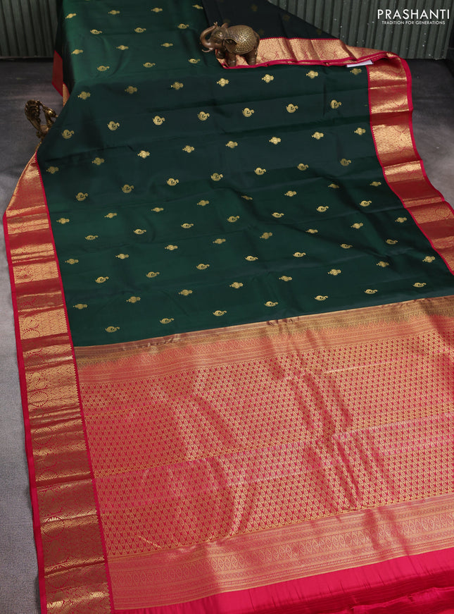 Pure kanchipuram silk saree bottle green and pink with allover zari woven buttas and zari woven korvai border