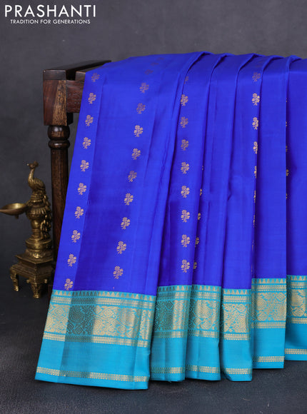 Pure kanchipuram silk saree blue and teal blue with allover zari woven buttas and rettapet zari woven korvai border