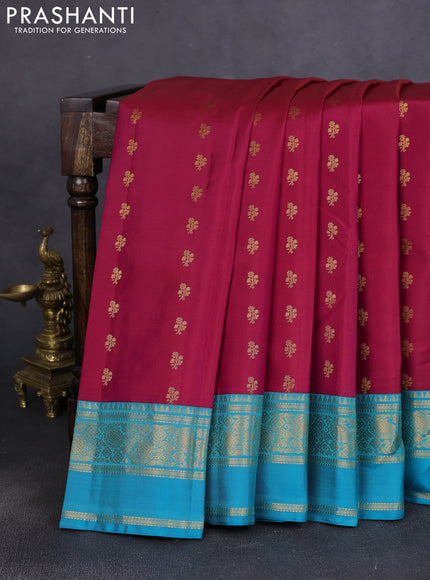 Pure kanchipuram silk saree dual shade of pink and teal blue  with allover zari woven buttas and rettapet zari woven korvai border