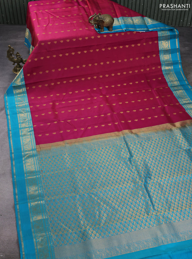 Pure kanchipuram silk saree dual shade of pink and teal blue  with allover zari woven buttas and rettapet zari woven korvai border