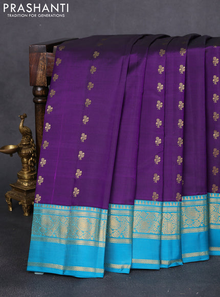 Pure kanchipuram silk saree violet and teal blue  with allover zari woven buttas and rettapet zari woven korvai border