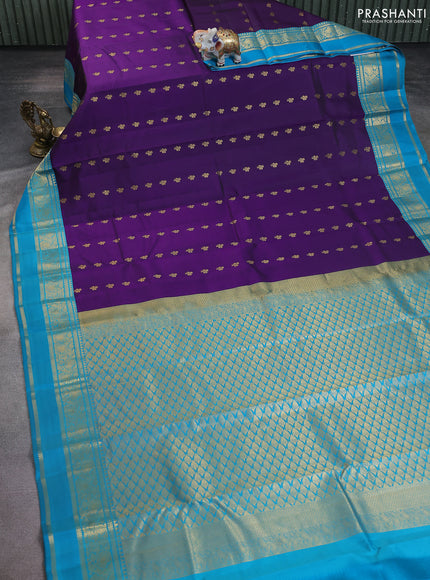 Pure kanchipuram silk saree violet and teal blue  with allover zari woven buttas and rettapet zari woven korvai border