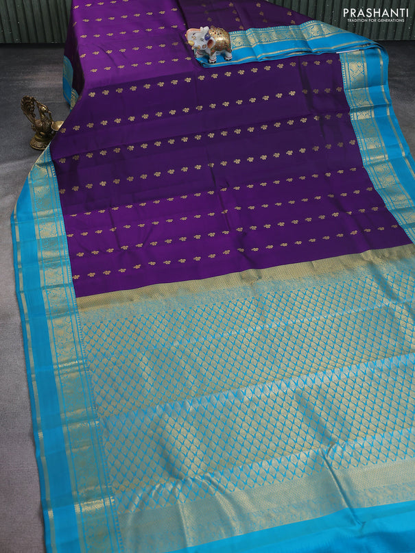 Pure kanchipuram silk saree violet and teal blue  with allover zari woven buttas and rettapet zari woven korvai border