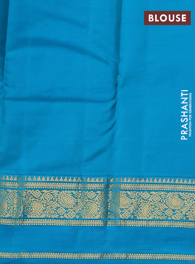 Pure kanchipuram silk saree violet and teal blue  with allover zari woven buttas and rettapet zari woven korvai border
