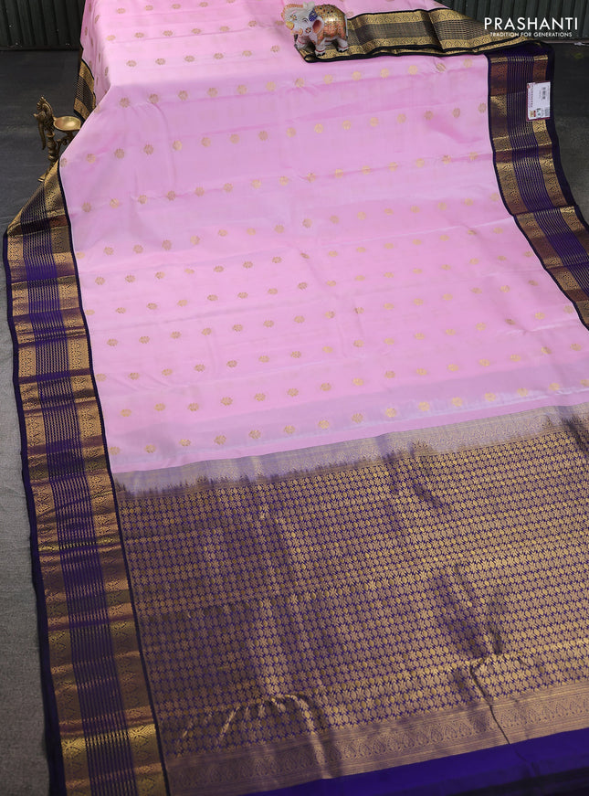 Pure kanchipuram silk saree light pink and blue with allover zari woven buttas and rich zari woven korvai border