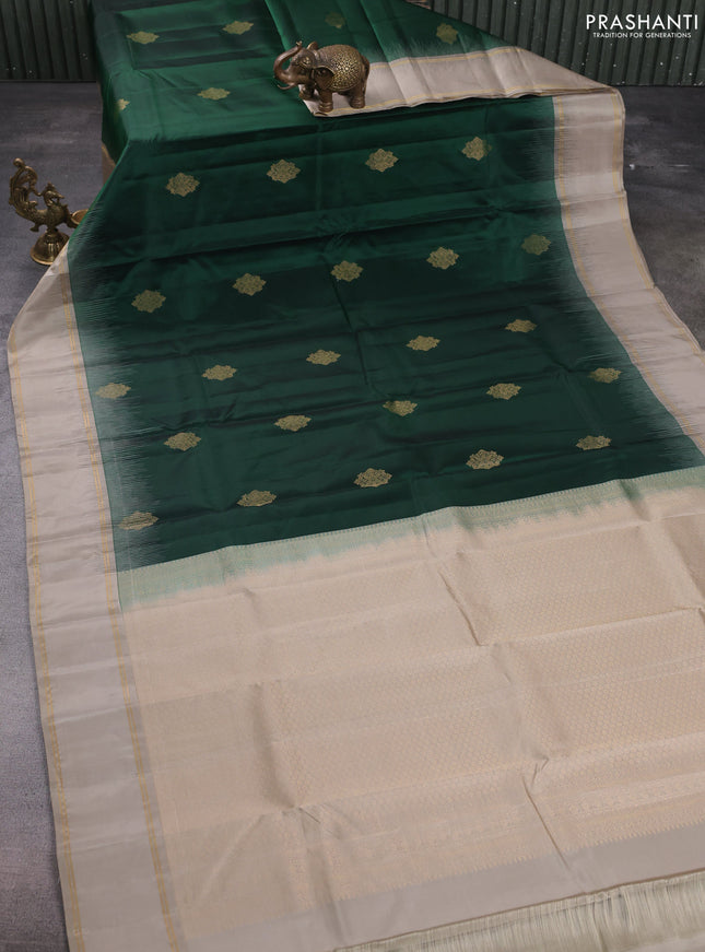 Pure kanchipuram silk saree dark green and elaichi green with zari woven buttas and rettapet zari woven border