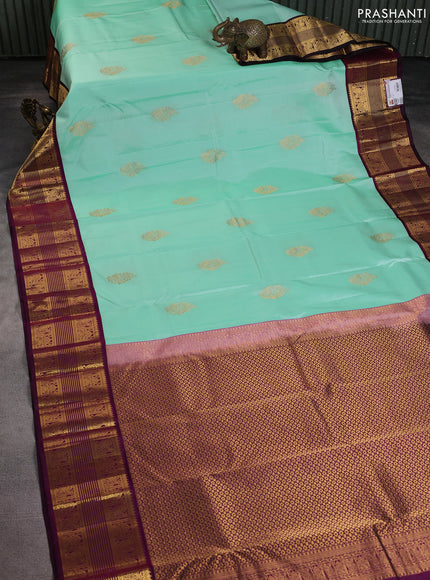 Pure kanchipuram silk saree teal shade and wine shade with zari woven buttas and rich zari woven border