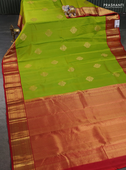 Pure kanchipuram silk saree light green and red with zari woven buttas and rich zari woven korvai border