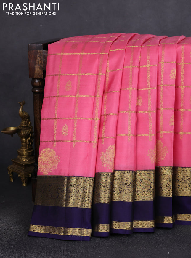Pure kanchipuram silk saree peach pink and navy blue with allover zari checks & buttas and rettapet zari woven border