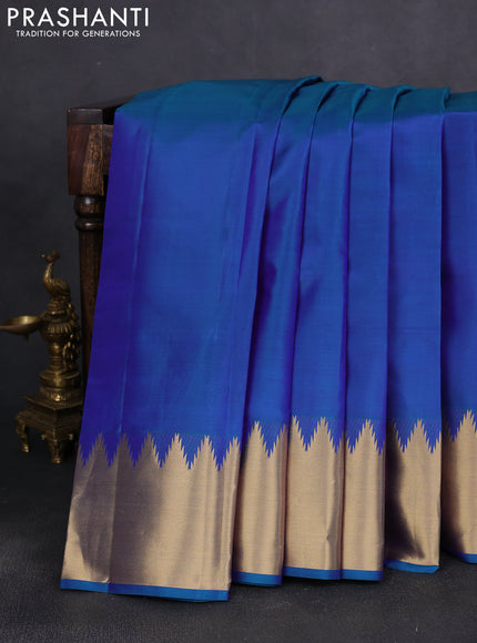 Pure kanchipuram silk saree teal blue with plain body and temple zari woven border