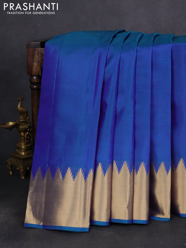 Pure kanchipuram silk saree teal blue with plain body and temple zari woven border