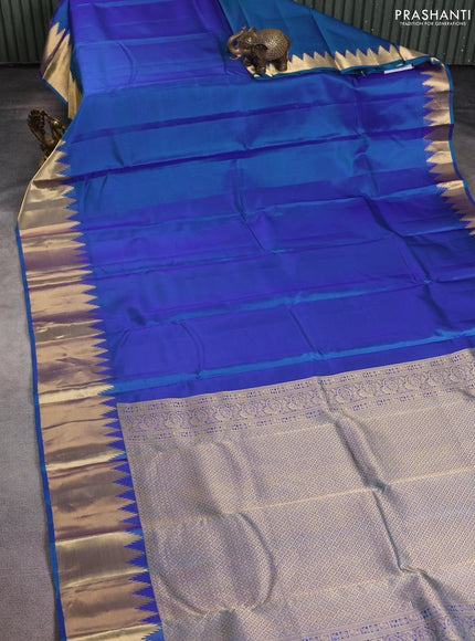 Pure kanchipuram silk saree teal blue with plain body and temple zari woven border