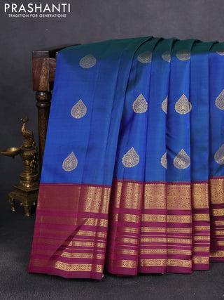 Pure kanchipuram silk saree peacock blue and wine shade with zari woven buttas and long zari woven border