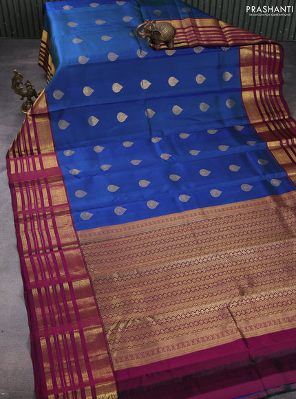 Pure kanchipuram silk saree peacock blue and wine shade with zari woven buttas and long zari woven border