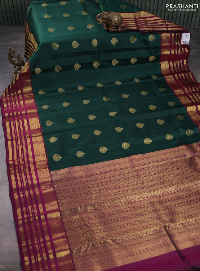 Pure kanchipuram silk saree bottle green and wine shade with zari woven buttas and long zari woven border