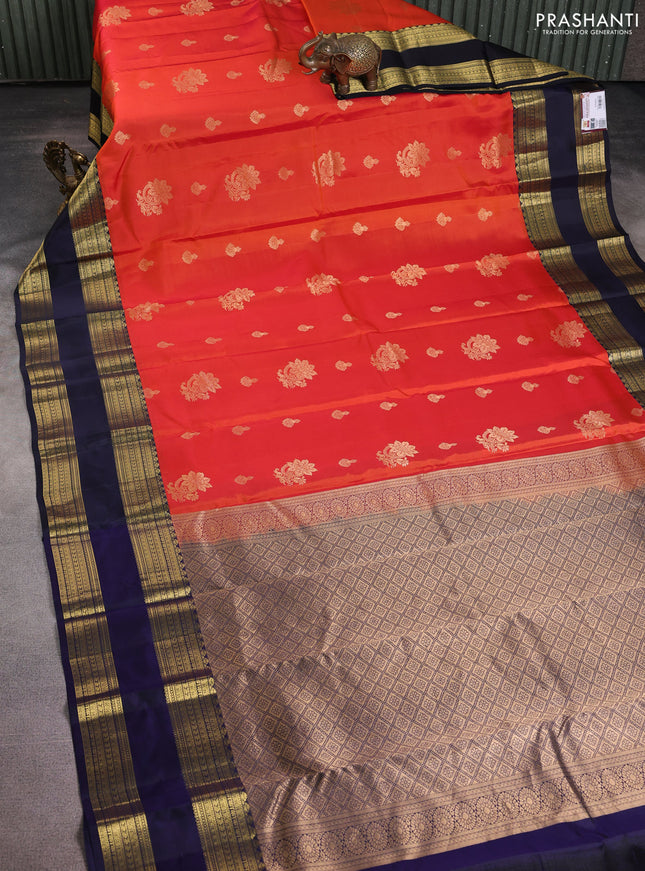 Pure kanchipuram silk saree rustic orange and navy blue with zari woven buttas and rettapet zari woven border