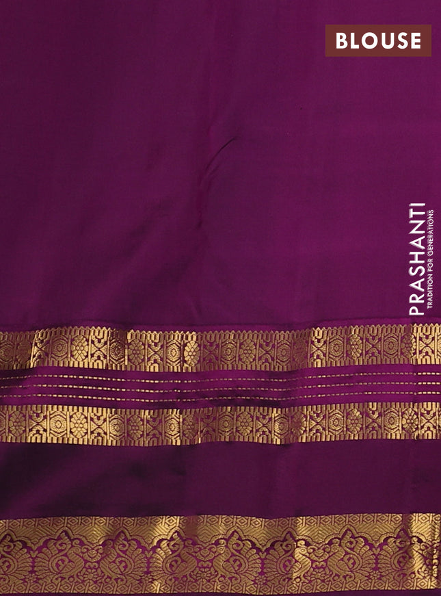 Pure kanchipuram silk saree dual shade of teal green and purple with zari woven buttas and rettapet zari woven korvai border