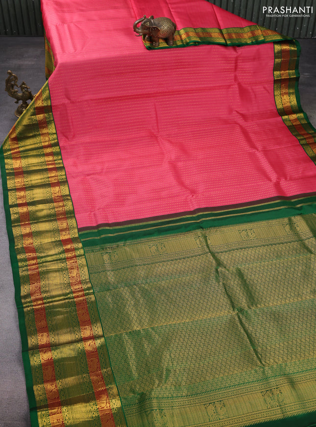 Pure kanchipuram silk saree peach pink and green with allover zari woven 1000 buttas and long zari woven korvai border