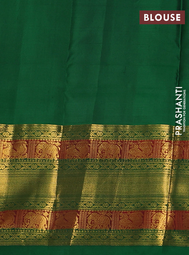 Pure kanchipuram silk saree peach pink and green with allover zari woven 1000 buttas and long zari woven korvai border