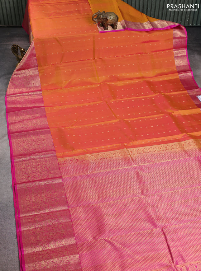 Pure kanchipuram silk saree dual shade of mustard yellow and pink with allover zari woven buttas and long rich zari woven border
