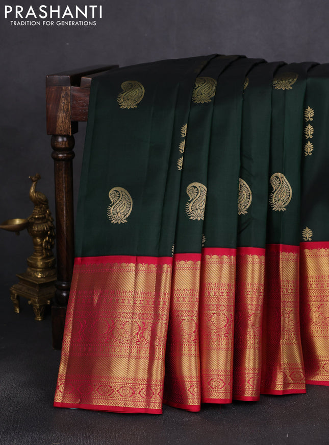Pure kanchipuram silk saree bottle green and red with paisley zari woven buttas and long zari woven korvai border