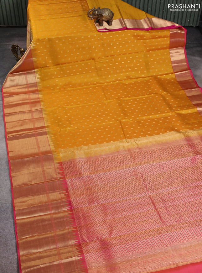 Pure kanchipuram silk saree mustard yellow and pink with allover zari woven buttas and long temple zari woven border