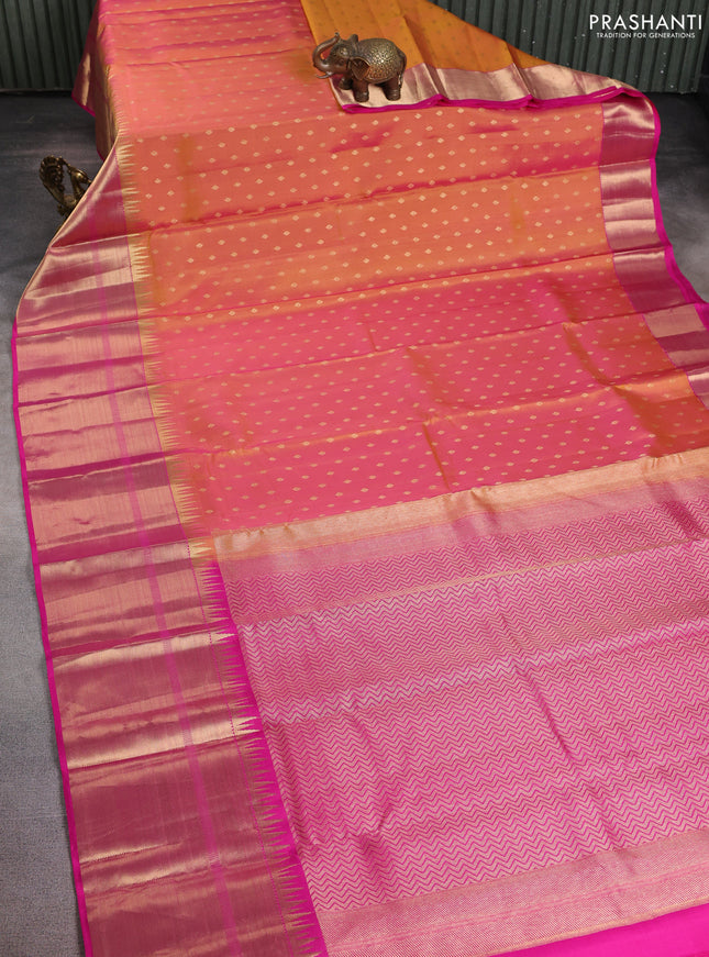 Pure kanchipuram silk saree dual shade of yellowish pink and pink with allover zari woven buttas and long temple zari woven border