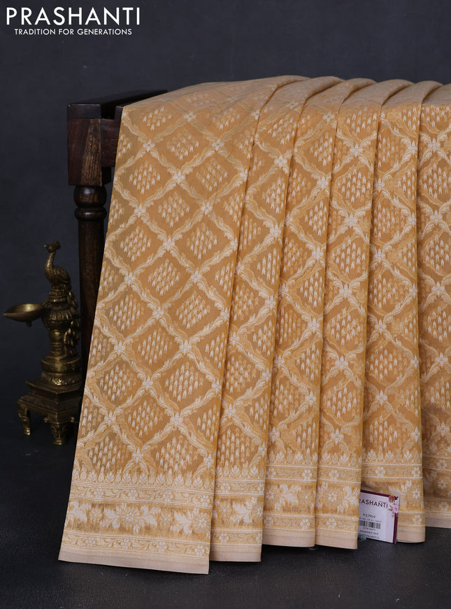 Banarasi silk cotton saree sandal with allover zari weaves and thread & zari woven border