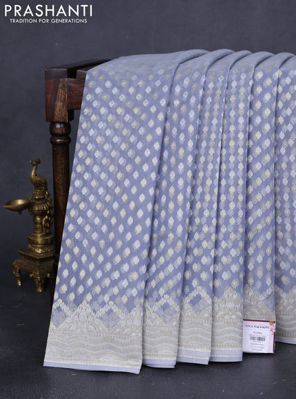 Banarasi silk cotton saree pastel grey with allover thread & zari woven buttas and thread & zari woven border