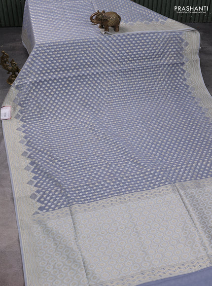 Banarasi silk cotton saree pastel grey with allover thread & zari woven buttas and thread & zari woven border