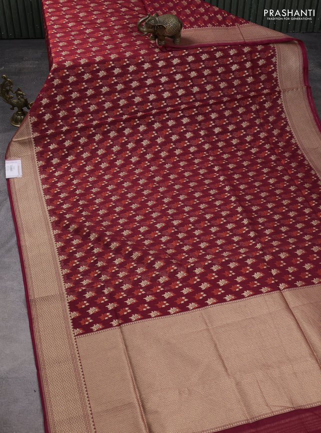 Banarasi silk cotton saree maroon with allover zari woven buttas and temple zari woven border
