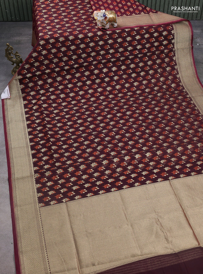 Banarasi silk cotton saree deep maroon with allover zari woven buttas and temple zari woven border