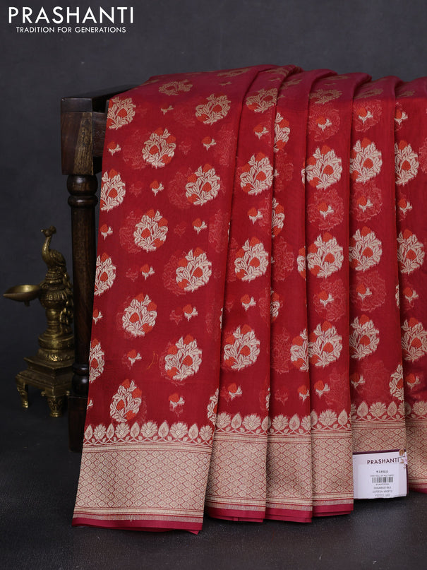 Banarasi silk cotton saree maroon with allover floral zari woven buttas and zari woven border