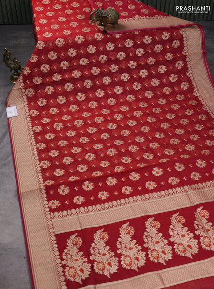 Banarasi silk cotton saree maroon with allover floral zari woven buttas and zari woven border