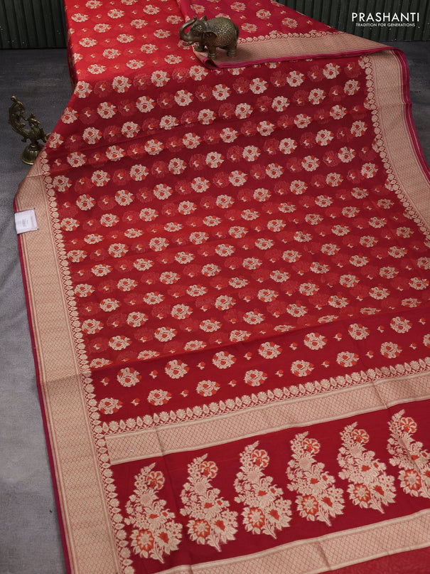Banarasi silk cotton saree maroon with allover floral zari woven buttas and zari woven border
