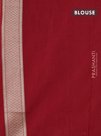 Banarasi silk cotton saree maroon with allover floral zari woven buttas and zari woven border