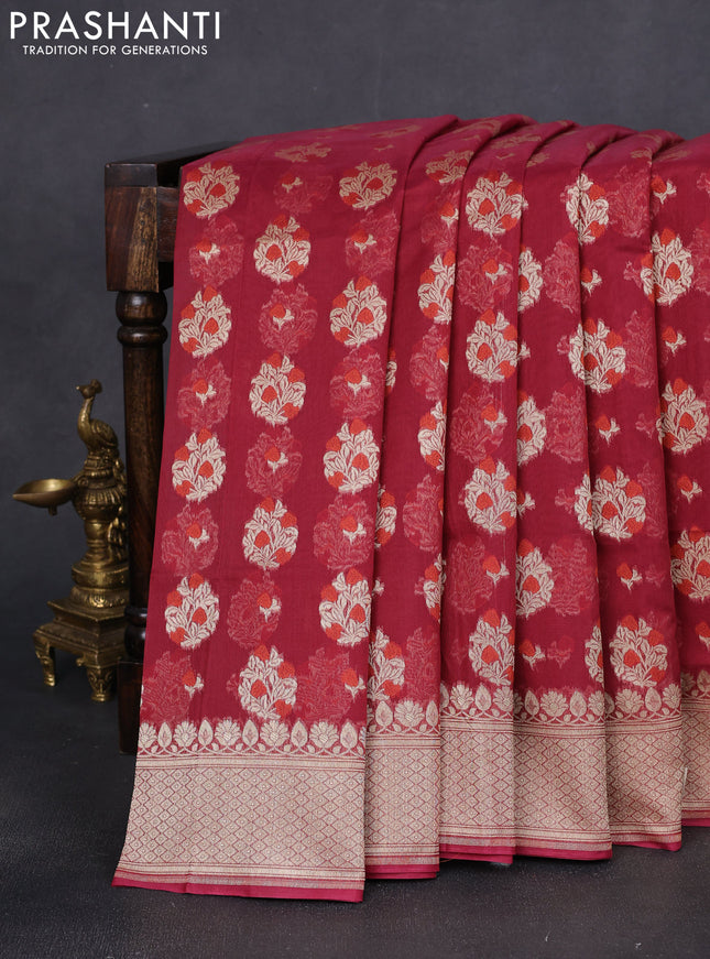 Banarasi silk cotton saree maroon with allover floral zari woven buttas and zari woven border