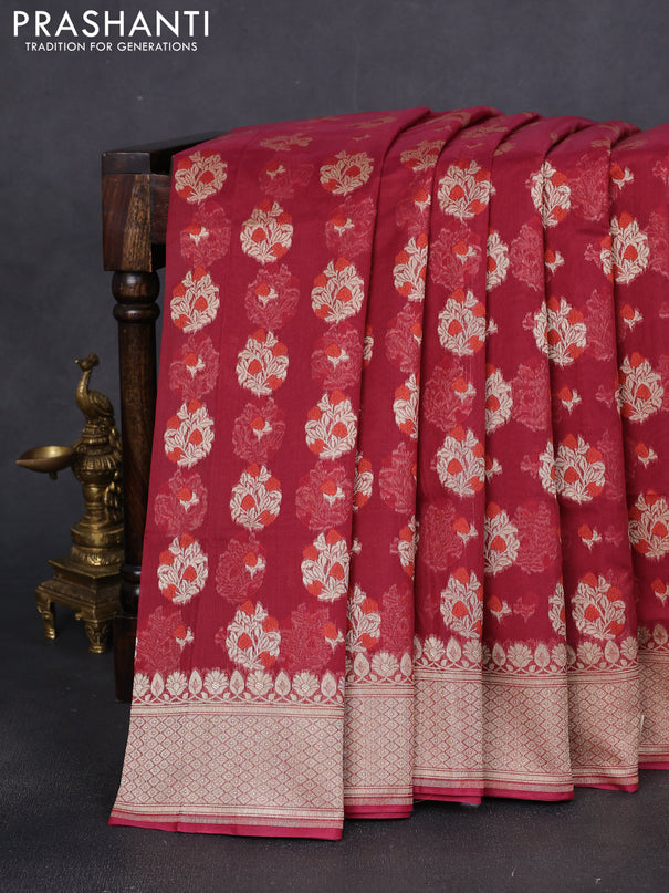 Banarasi silk cotton saree maroon with allover floral zari woven buttas and zari woven border