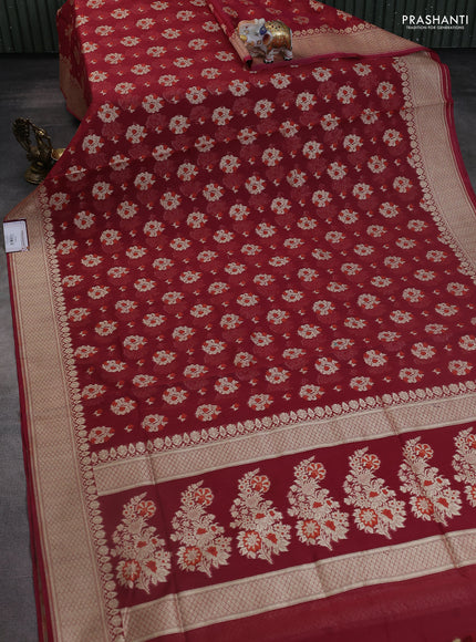Banarasi silk cotton saree maroon with allover floral zari woven buttas and zari woven border
