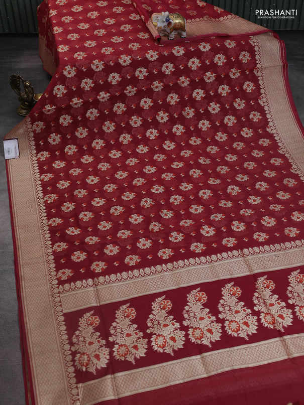 Banarasi silk cotton saree maroon with allover floral zari woven buttas and zari woven border