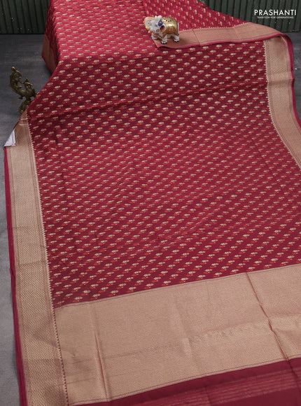 Banarasi silk cotton saree maroon with allover zari weaves and temple zari woven border