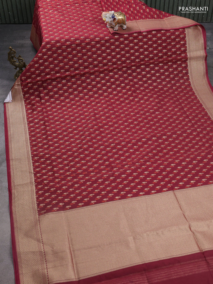 Banarasi silk cotton saree maroon with allover zari weaves and temple zari woven border