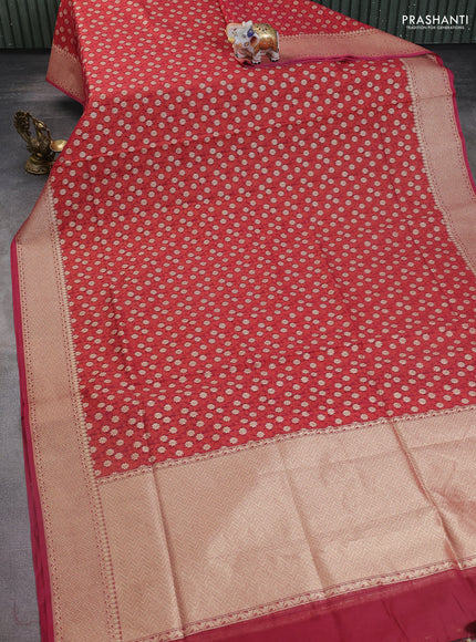 Banarasi silk cotton saree maroon with allover thread weaves & zari woven buttas and temple zari woven border